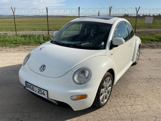 Volkswagen New Beetle foto 1