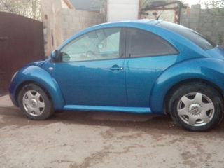 Volkswagen New Beetle foto 2