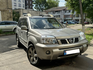 Nissan X-Trail foto 1