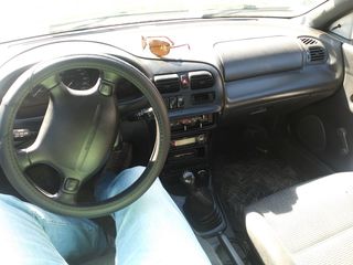 Mazda 323 foto 1