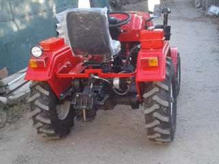 Vînd tractor Aproximativ NOU! foto 6