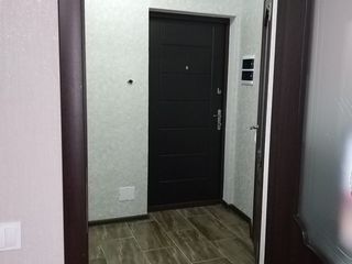 Vind apartament in bloc nou , euro reparat + mobila si tehnica parțial foto 8