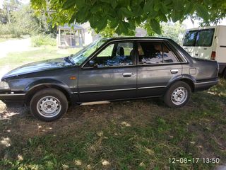 Mazda 323 foto 1