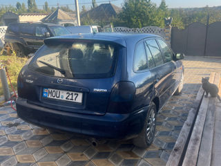 Mazda 323 foto 1