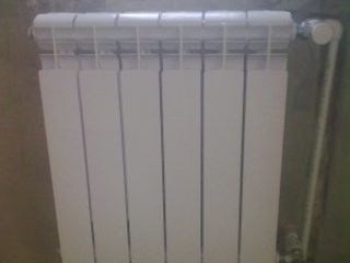 Sisteme de încălzire,Tavi,calorifere,cazane, încălzire în pardoseală. foto 4