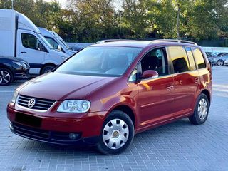 Volkswagen Touran foto 1