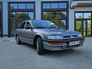 Honda Concerto foto 1