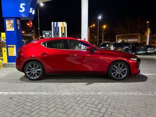 Mazda 3 foto 1