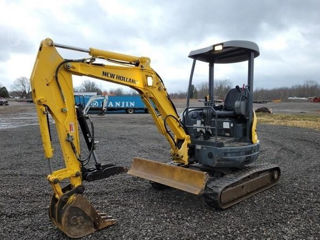 Excavator mic de vanzare de la new holland conditie super