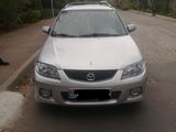 Mazda 323 foto 1