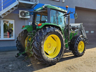 John Deere cu încărcător foto 2