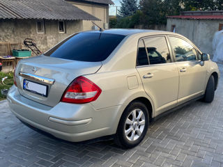 Nissan Tiida фото 3