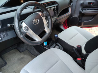 Toyota Prius c фото 7