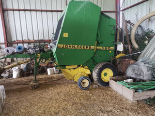 Presse John Deere 580 foto 1