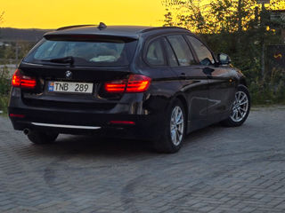 BMW 3 Series Touring foto 4