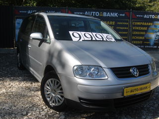 Volkswagen Touran foto 1