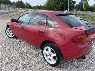 Mazda 323 foto 1