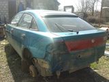 Mazda 323 F piese anul 1995 foto 1