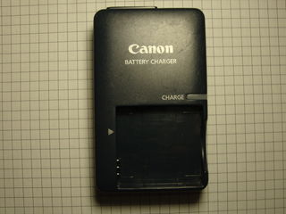 Încarcator  pentru foto aparate Canon, model CB-2LVE, in stare buna. Pret: 50 lei foto 1