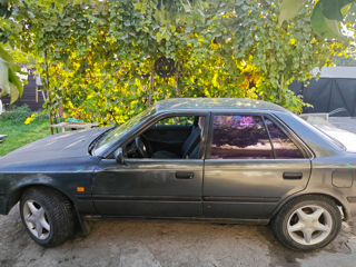 Toyota Carina foto 2