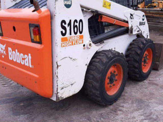 Bobcat S220 мини погрузчик foto 1