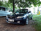 Mazda 323 foto 1