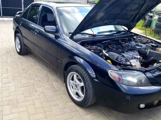 Mazda 323 foto 1