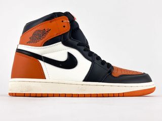 nike high top orange and black