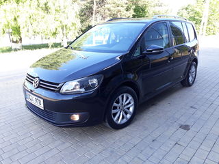 Volkswagen Touran foto 1