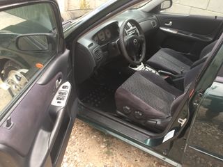 Mazda 323 foto 4