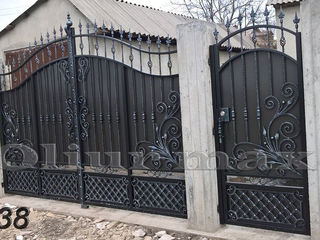 Balustrade, porți, garduri, copertine, gratii, uși metalice și  alte confecții din fier forjat. foto 11