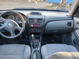 Nissan Almera foto 8