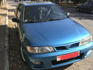 Nissan Almera foto 1