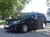 Volkswagen Touran foto 1