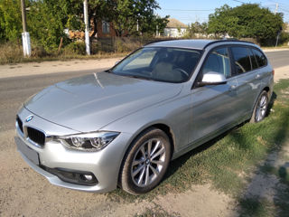 BMW 3 Series Touring foto 2