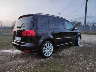 Volkswagen Touran фото 9