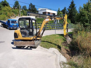 Mini-excavator , basculante