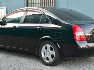 Nissan Primera p11,p12 foto 2