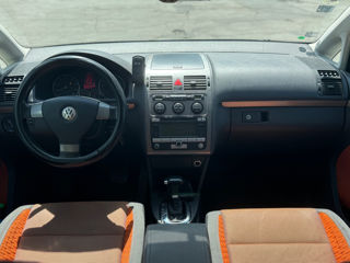 Volkswagen Touran фото 2