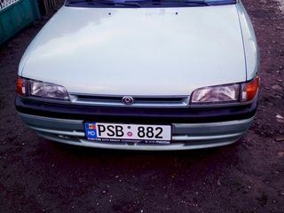 Mazda 323 foto 1