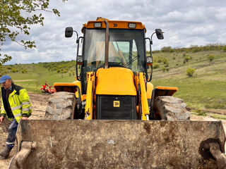 Vind excavator JCB foto 8