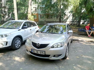 Mazda 3 foto 1