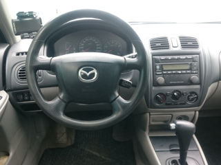 Mazda 323 foto 1