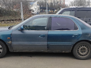 KIA Clarus фото 3