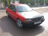 Mazda 323 foto 1