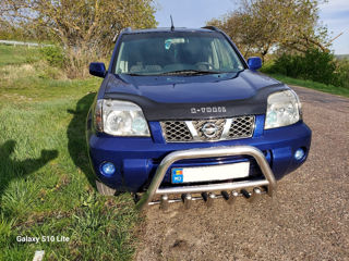 Nissan X-Trail foto 1