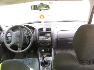 Mazda 323 foto 9