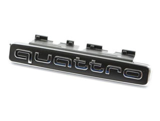 Эмблема на решётку Quattro для Audi
