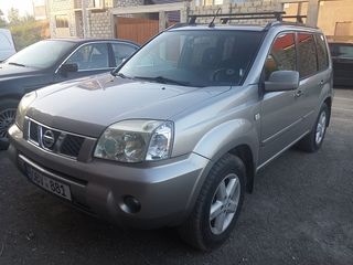 Nissan X-Trail foto 1