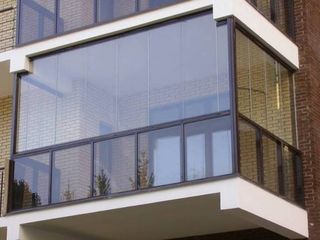 Sisteme glisante din sticlă pentru balcoane și terase foto 5